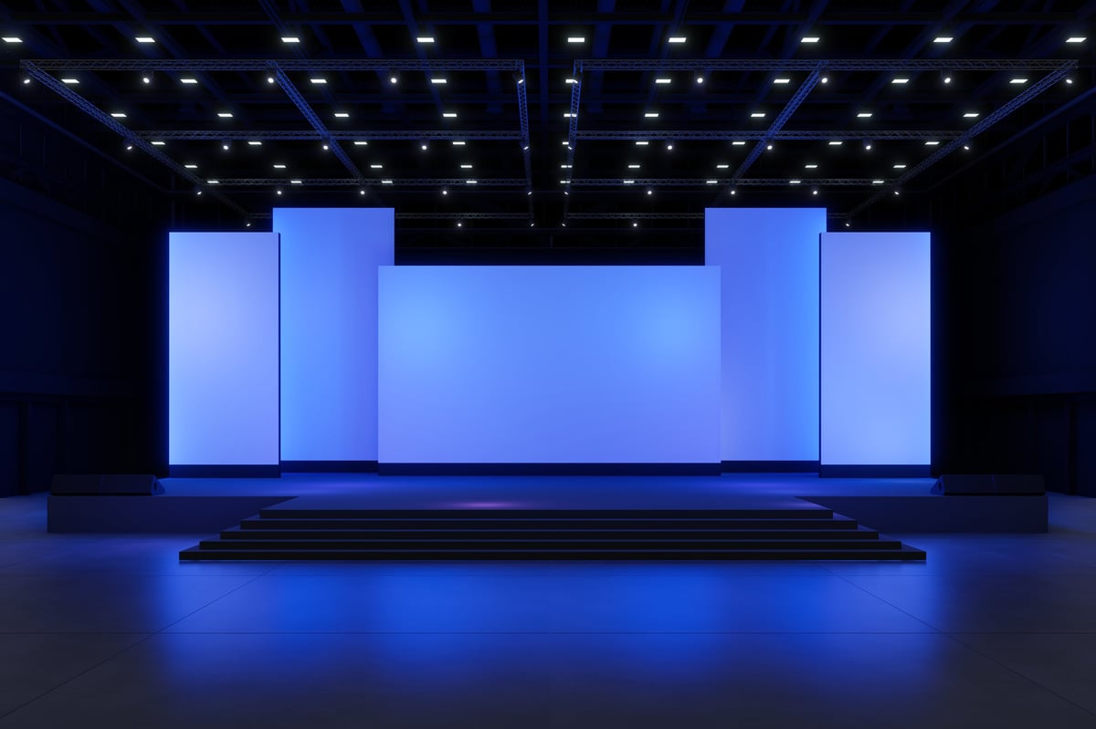 An illuminated stage set for a fashion presentation